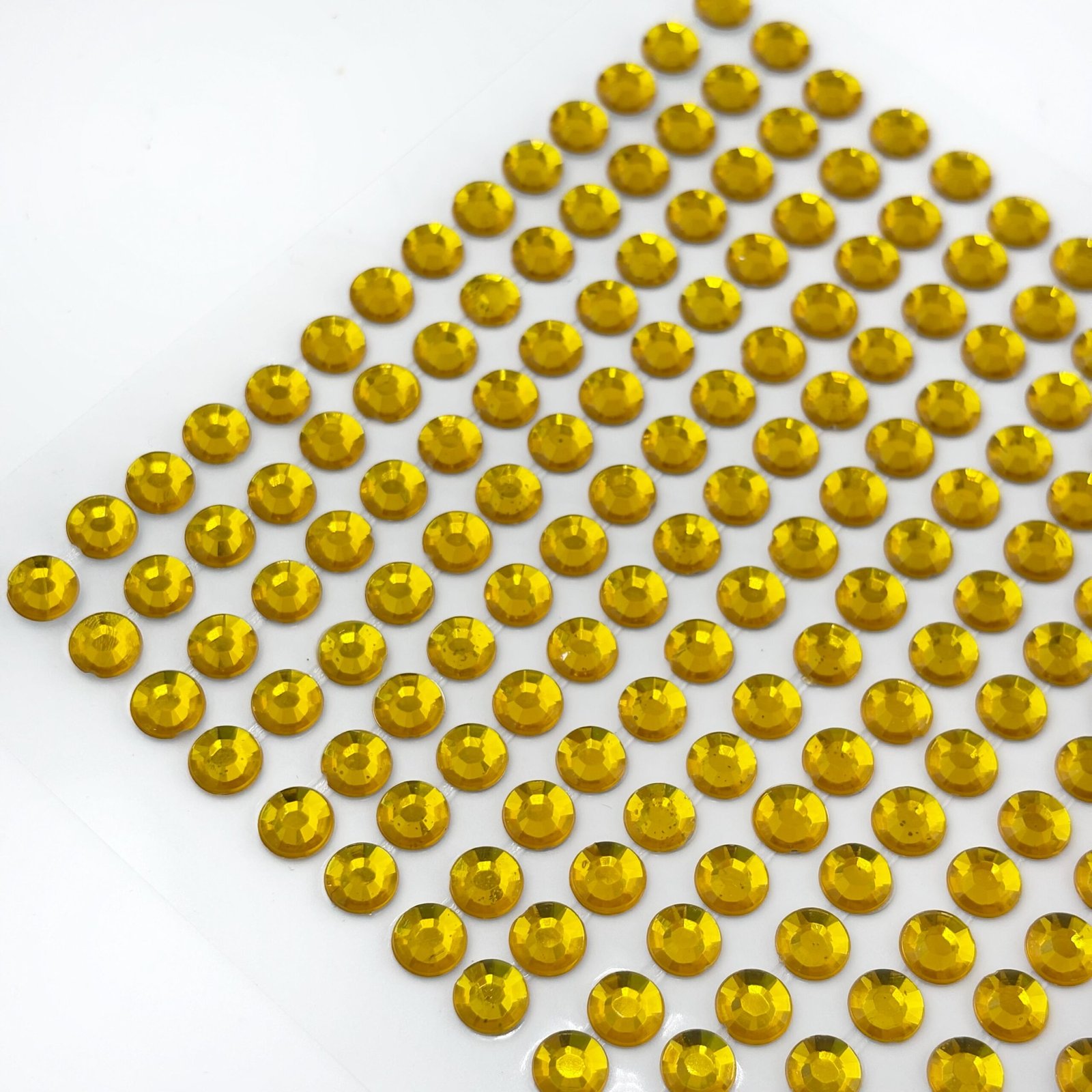 Adhesive rhinestone gold