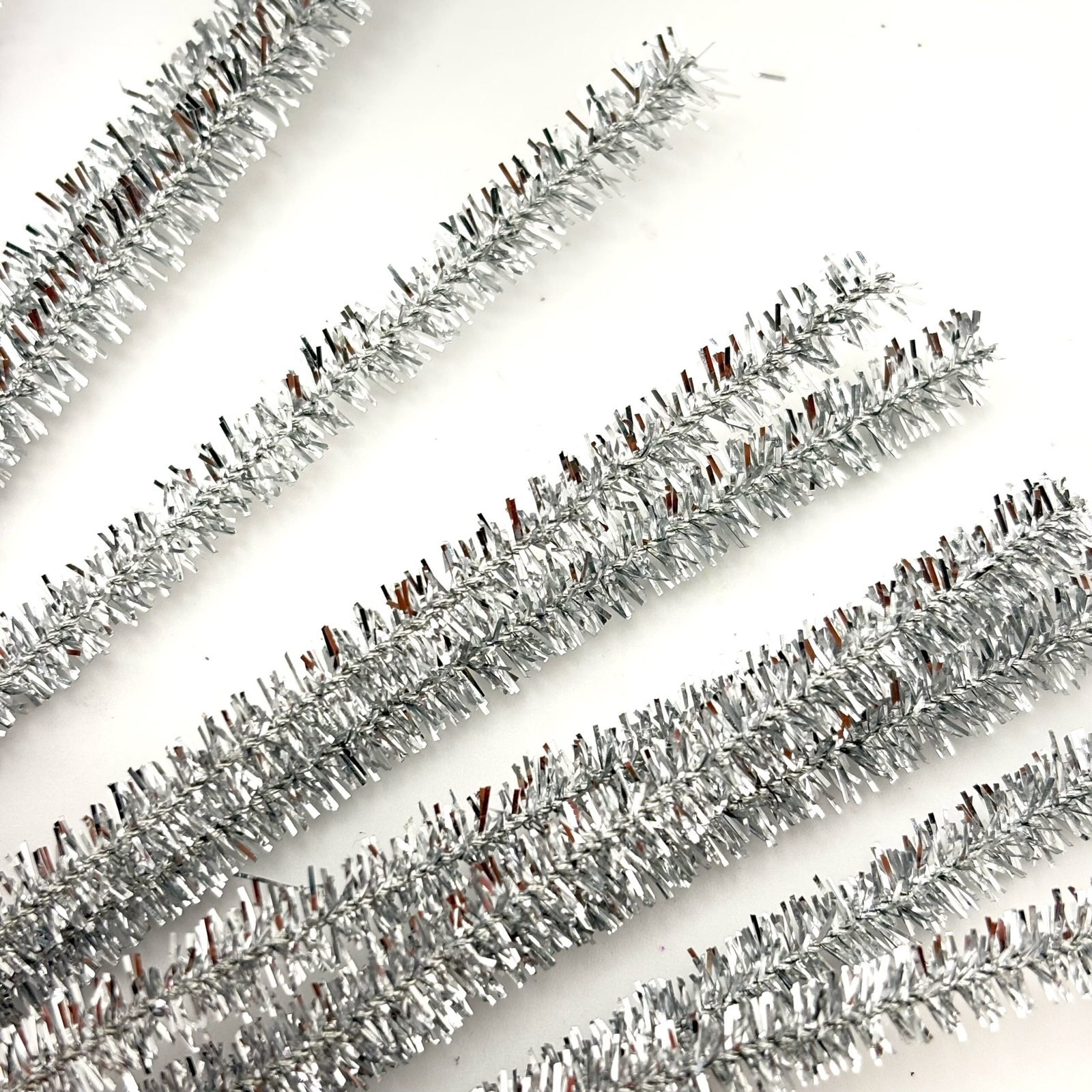 Silver chenille pipe cleaners for homecoming mums