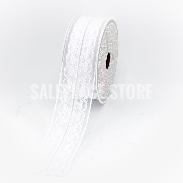 White scalloped heart overlay ribbon for Valentines day and homecoming mum crafts. Retail and wholesale pricing.